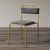Sleek and stylish armless dining chair pair, upholstered in gray with a luxurious gold finish, modern design
